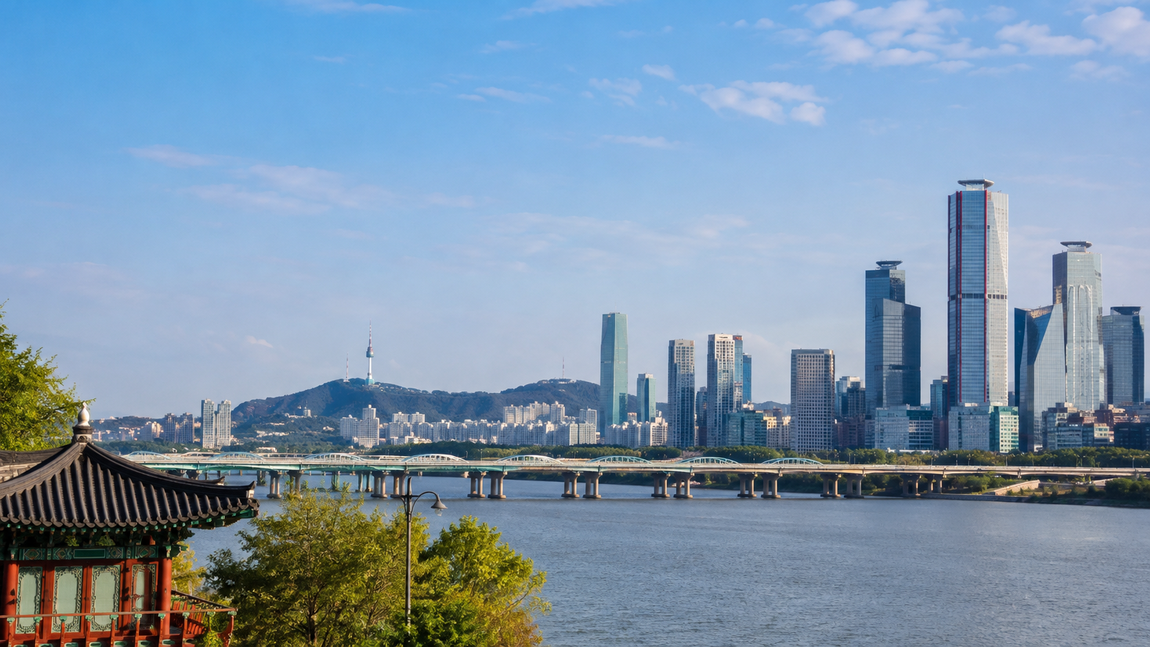Vista ensolarada de Seul sobre o rio Han com a Torre Namsan